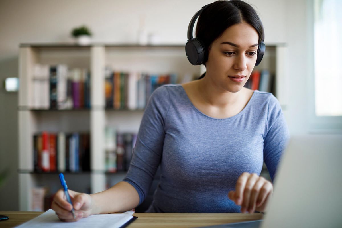 woman_writing_headphones_resize