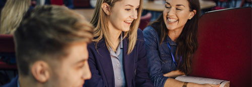 Group of students using computer